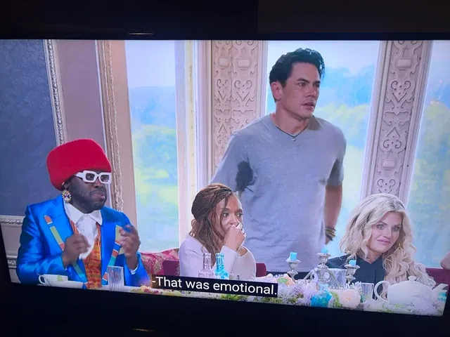 A screenshot from the Traitors Season 3 showing Tom Sandoval with the biggest, wettest, nastiest pit stains you've ever seen