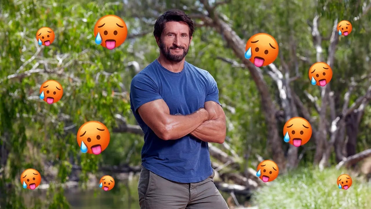 An image of Jonathan LaPaglia, host of Australian Survivor, looking incredibly muscular and glistening with his arms crossed, biceps bulging, surrounded by that horny little emoji face, the one with its tongue sticking out and sweat pouring off it